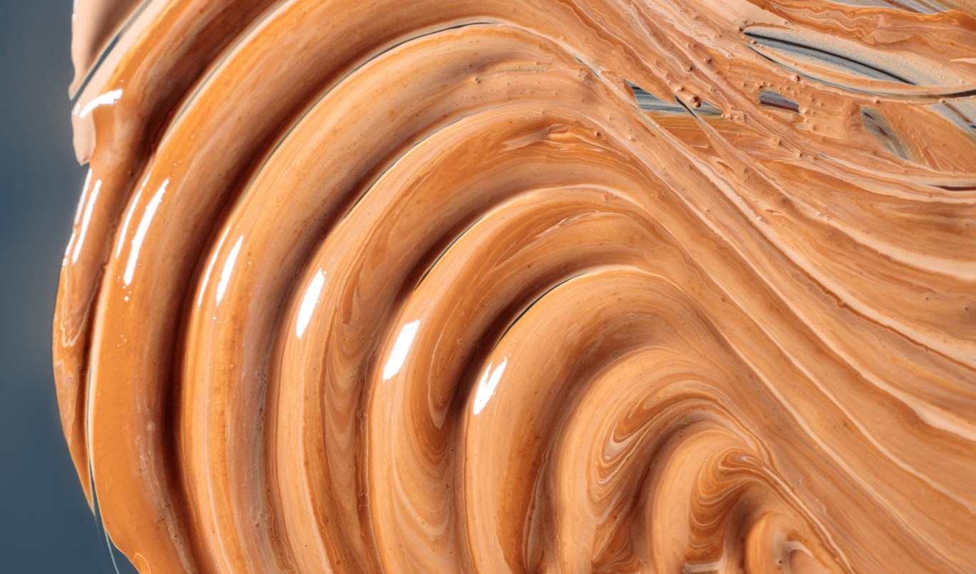 Nærbilde av concealer med bølgemønster.
